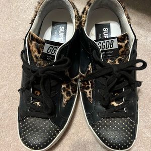 Golden Goose Black low tops size 6.5. Purchased at at Short Hills, NJ store.